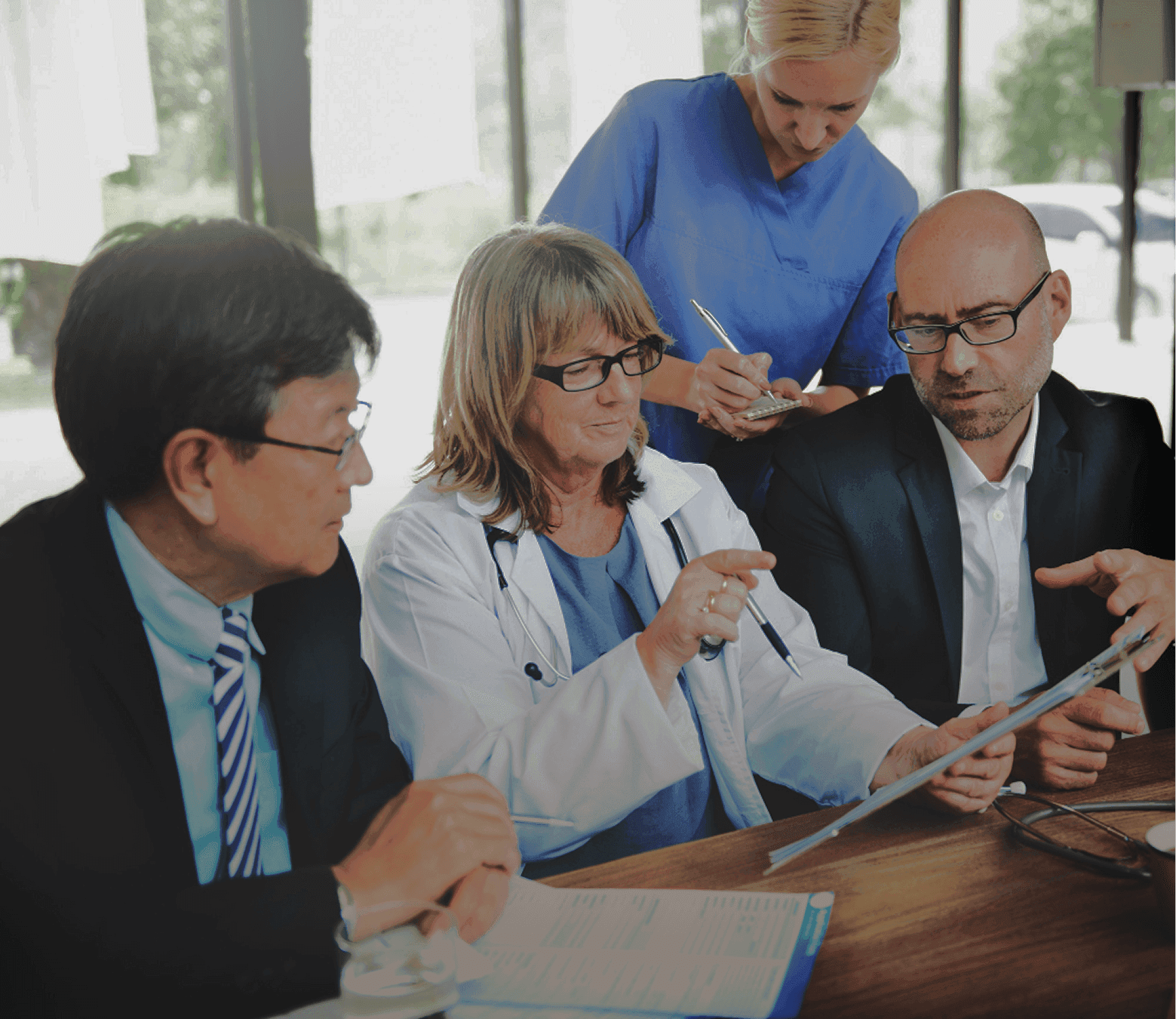 Business professional in a suit holding out hands with a glowing security shield and checkmark symbol, representing trust and cybersecurity.